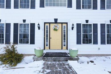 Inviting custom paver sidewalk leads to front door