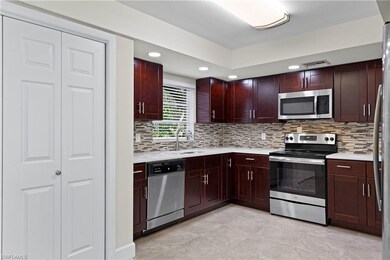 washer/dryer hook ups behind bi fold doors, tile f
