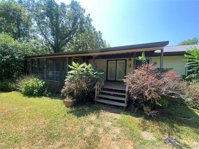 Back porch is the main entrance used by the seller