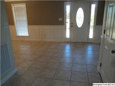 TILE FLOOR IN FOYER