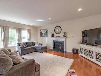 Large family room with beautiful hardwood floors, 