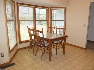 Dinette with bay window.