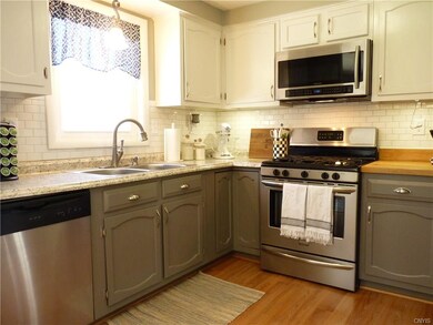 LOOK at this GLEAMING kitchen, fresh subway tile b