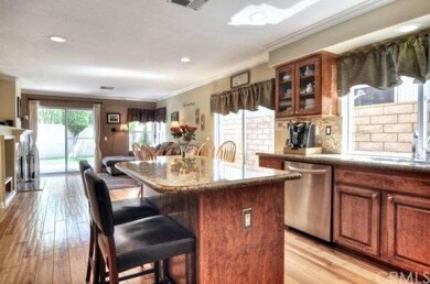 Kitchen island with bar seating.  Open to the brea