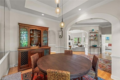 Such beautiful lighting in the tray ceiling and archway. And the mirrored wall adds a touch of elegance.