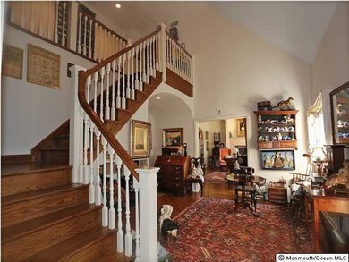 Grand Staircase in lovely Foyer Area
