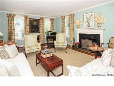 Living room with one of three fireplaces