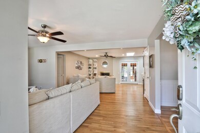 Inviting Entryway that embodies an oversized closet, shepherds you to the wonderful open floor plan.