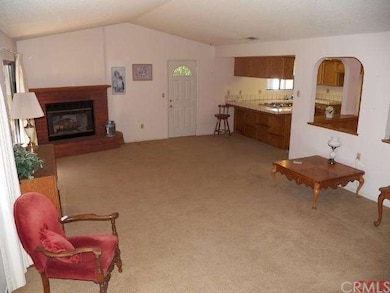 Another view of the living room towards kitchen an