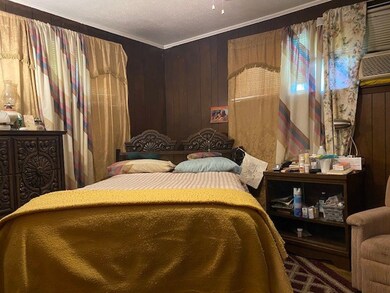 bedroom with half bath
