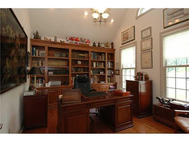 Den. First floor den with vaulted ceiling, built i