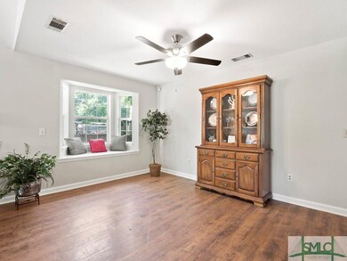Dining Room with beautiful bay window and window s