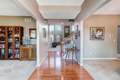 View into the home from the front door. Entryway offers great natural lighting.