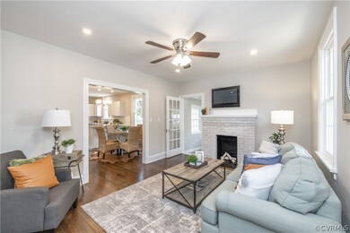 Refinished hardwoods, fireplace, recessed lights,
