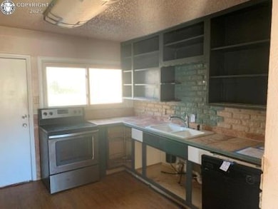 Large kitchen with lots of open cabinet space