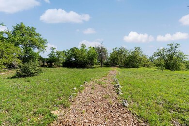 View of yard with a rural view
