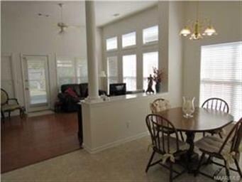 Open to dining room, kitchen and foyer