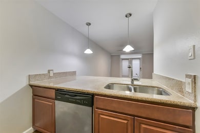 The kitchen island doubles as a casual dining spac