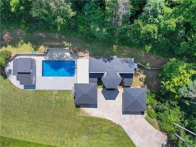 View from above of property featuring a pool