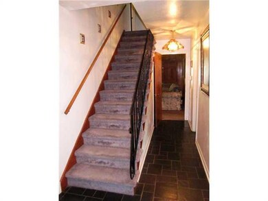 Stairwell. Up to all bedrooms.