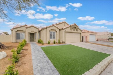 Mediterranean / spanish house with driveway, a til