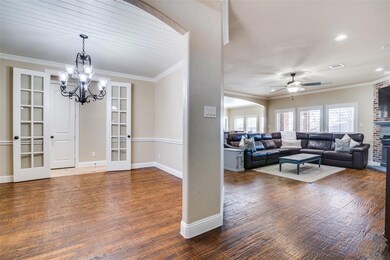 View from entry. Dining room has French doors with kitchen access.