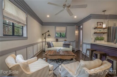 Beautiful crown molding and wood trim accents this