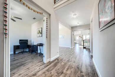 Corridor featuring hardwood / wood-style floors