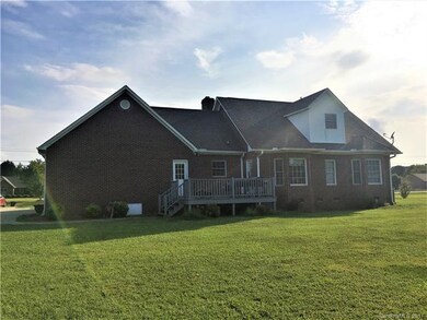 Deck has entrance doors to living room & mud room