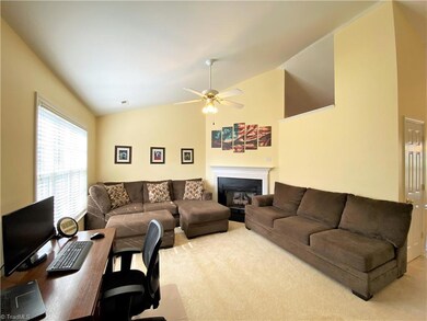 Additional view of living room with gas log fireplace