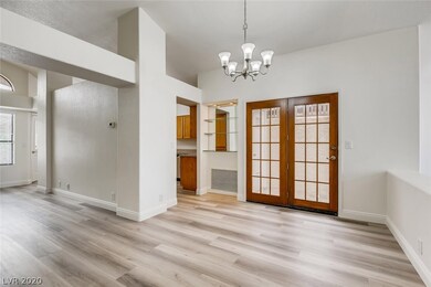 French Doors Open Up to a Small Atrium Off the Bre