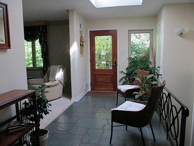 Exterior Front. Slate entrance with skylight