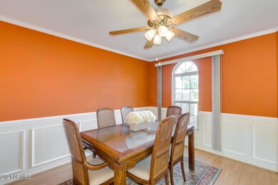 Formal Dining Room with custom wainscot walls