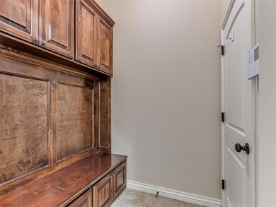 Mudroom featuring light tile patterned floors