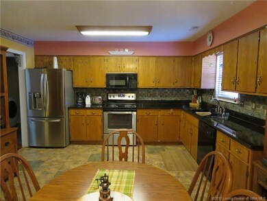 Kitchen with Granite countertops and Tile Flooring