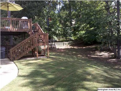 Enjoy the large backyard!  Nice shade!