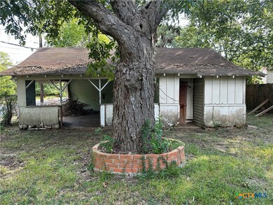 Detached carport and workshop