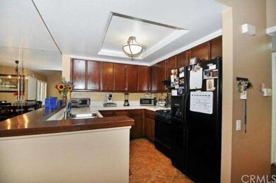 and looking at the kitchen from the living rom