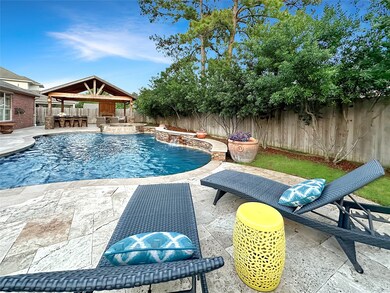 Host all the pool parties this summer in your own backyard oasis.  Heated chlorine swimming pool features sun deck with bubblers, spa overflow and two scupper fountains.  Drop in robotic pool cleaner makes maintenance a breeze.