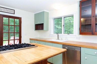 Island allows seating in the kitchen.