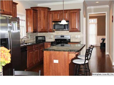 GRANITE COUNTER AND CUSTOM CABINET IN KITCHEN