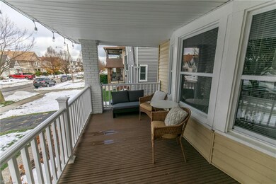 The new railing on the front porch makes it even more charming.