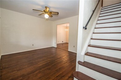 Freshly painted living room with refinished hard w