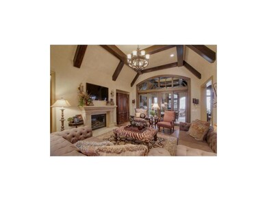 Living room and entrance to 2nd floor lanais.