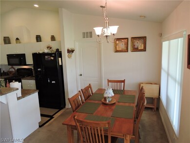 Dining area set aside of kitchen area