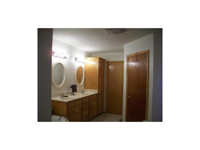 Master bath double vanity and walk in closet.