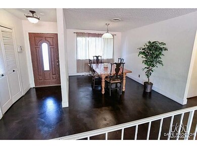 Property Photo. FORMAL DINING ROOM AND ENTRY WAY