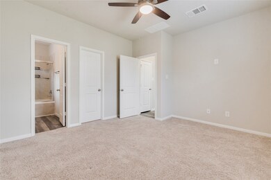 Primary bedroom downstairs with ensuite bath.