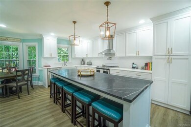Full kitchen renovation with stunning 9' granite island