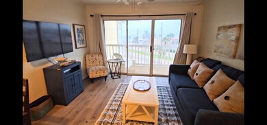 view from kitchen looking out to balcony and gulf